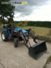 Traktor New Holland T-tC211D